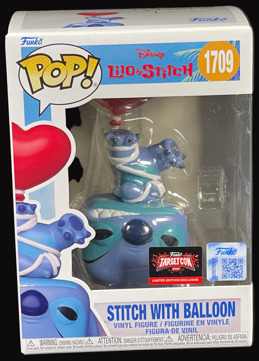 Funko Pop! Stitch with Balloon vinyl figure in packaging on a black stand against a dark background